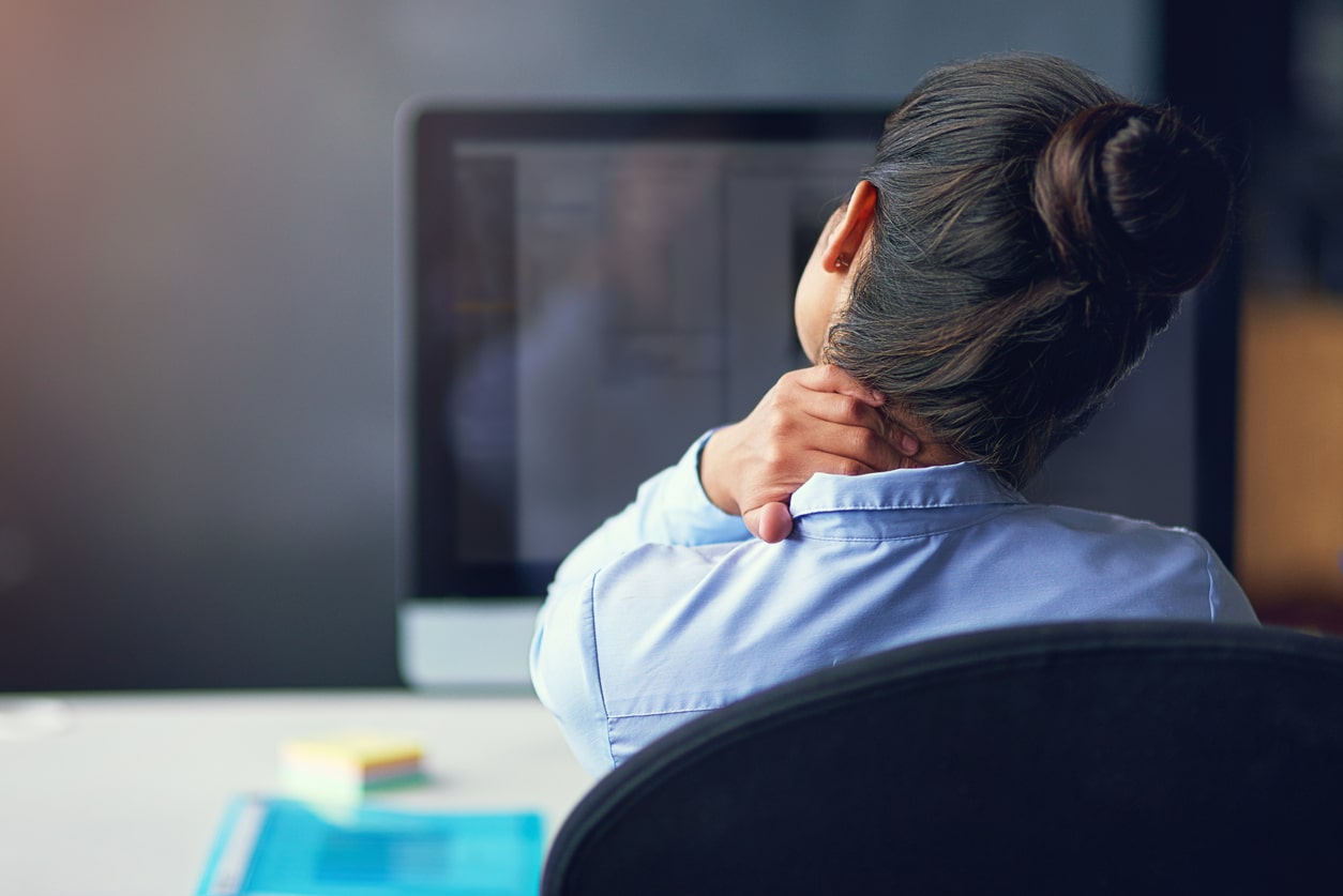 Female employee showing stress in dealing with business problems.